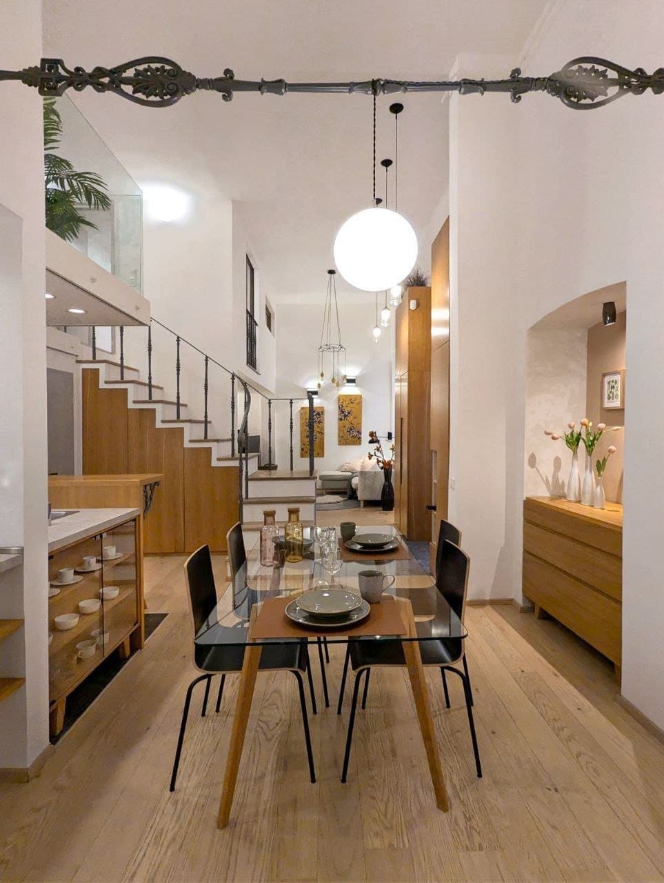 Living room — Luxury Apartment Budapest 6th District – Renovated 1-Bedroom Gallery Flat with All-Inclusive Rent